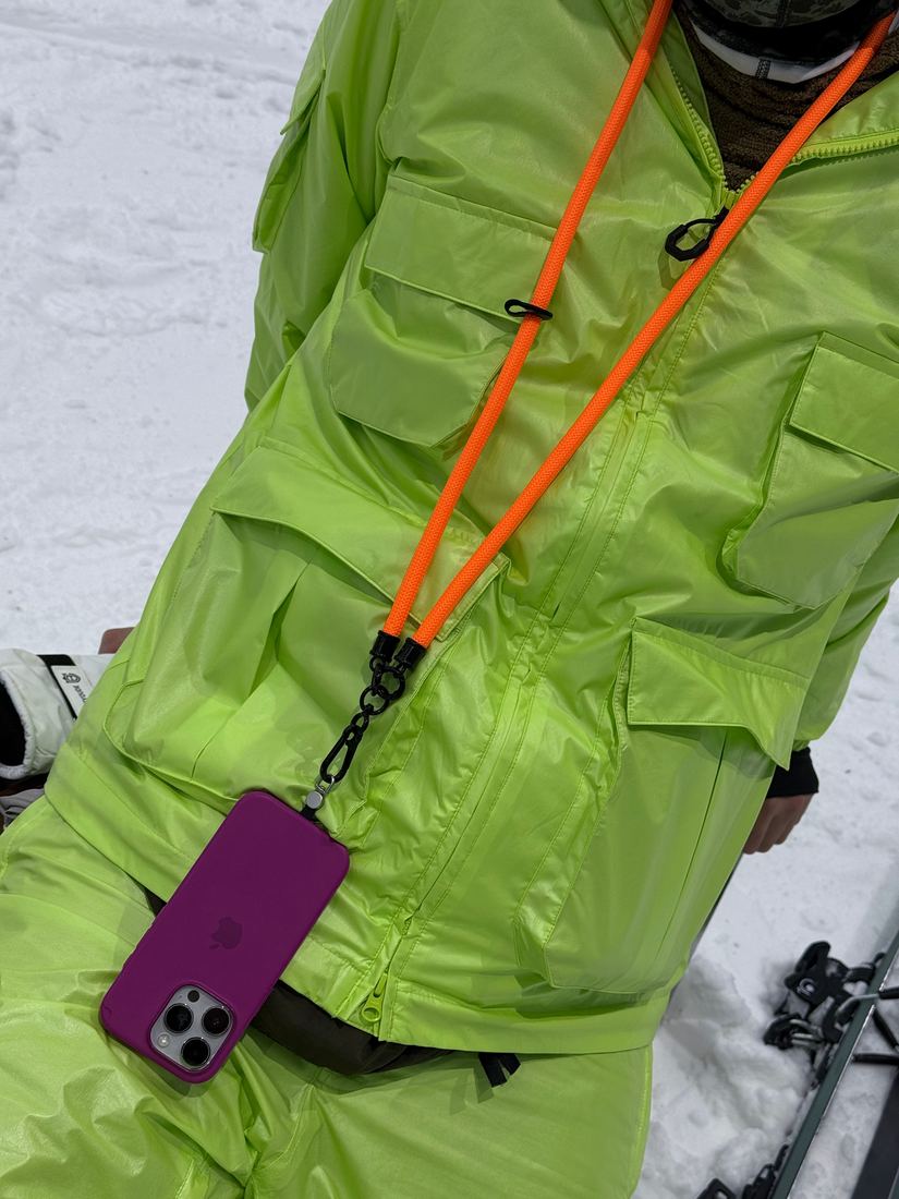Orange lanyard on a ski jacket