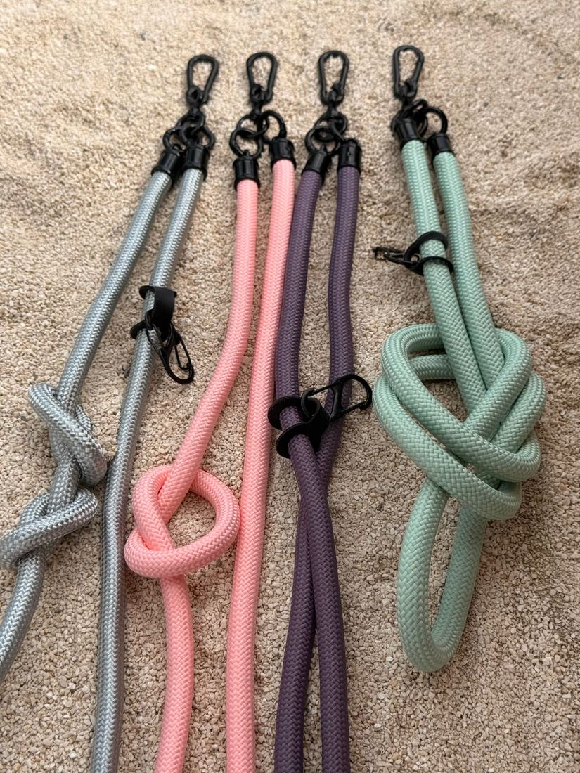 Four lanyards on sand